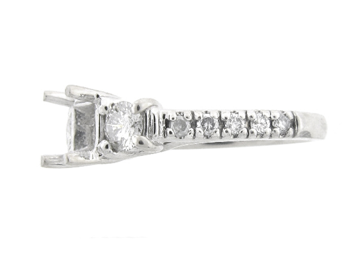 14KT W/GOLD,  RD 0.57CTW